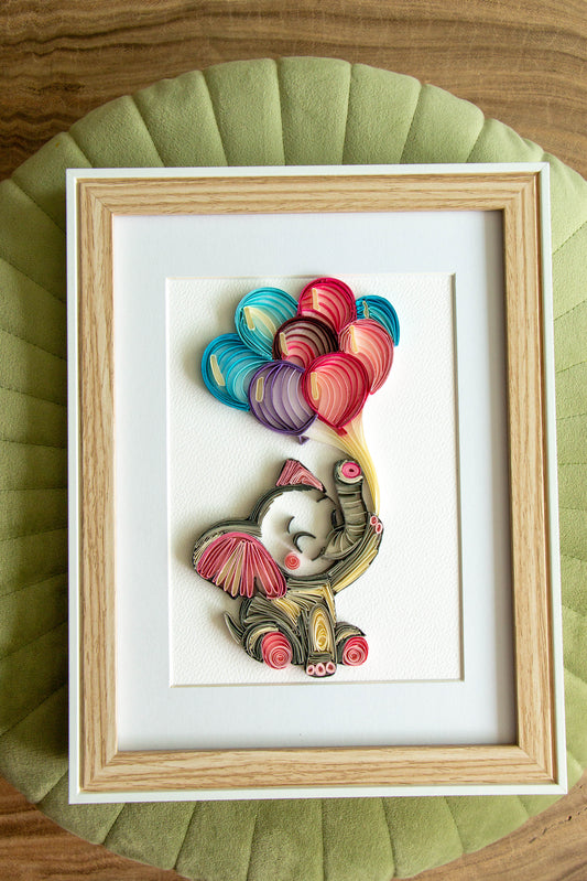 Small baby elephant with balloons from paper. Baby room present quilling artwork. ArtyMargarita.com Unique artworks from paper.