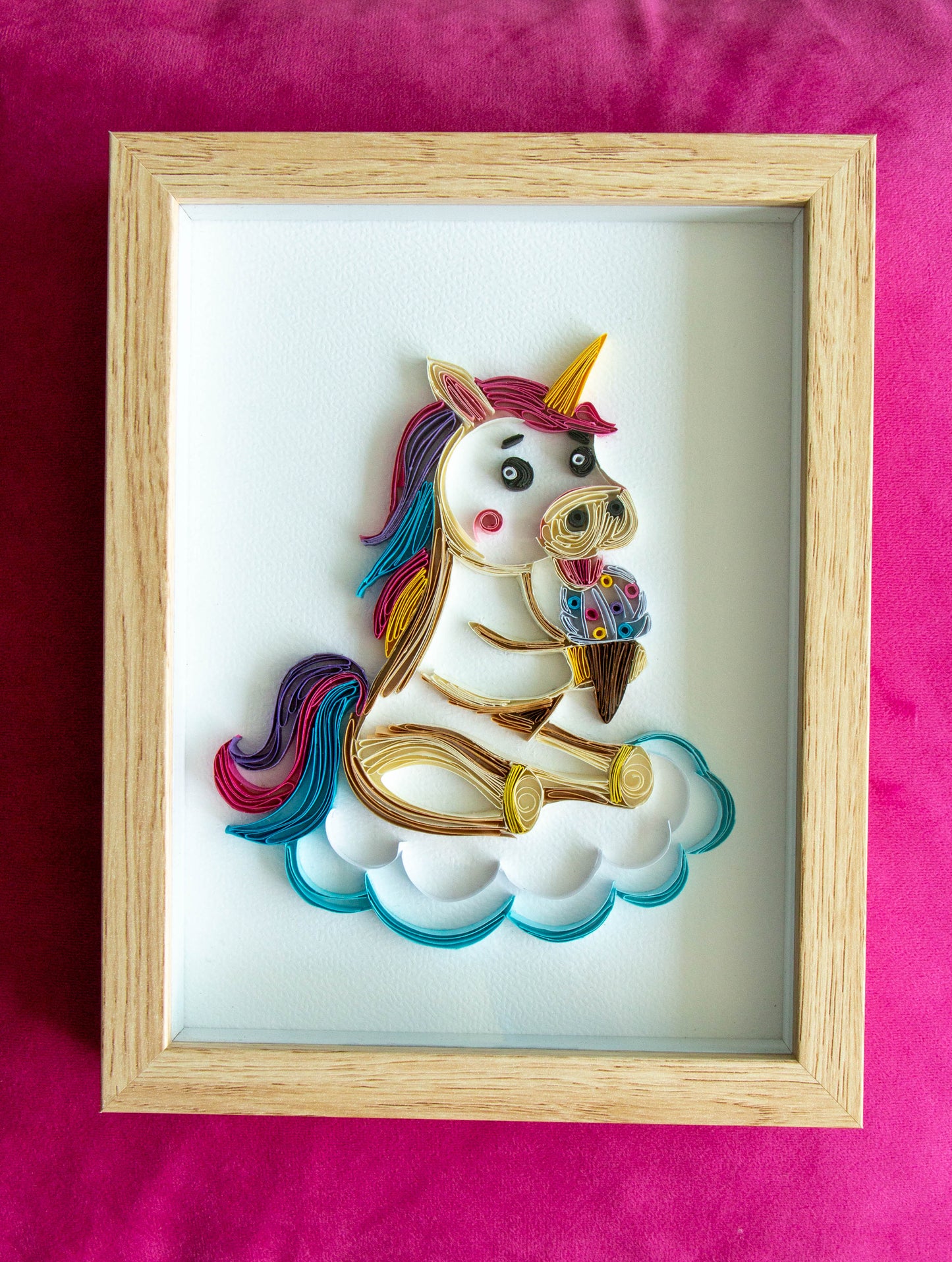 Small baby Unicorn eating ice-cream from paper. Baby room present quilling artwork. ArtyMargarita.com Unique artworks from paper